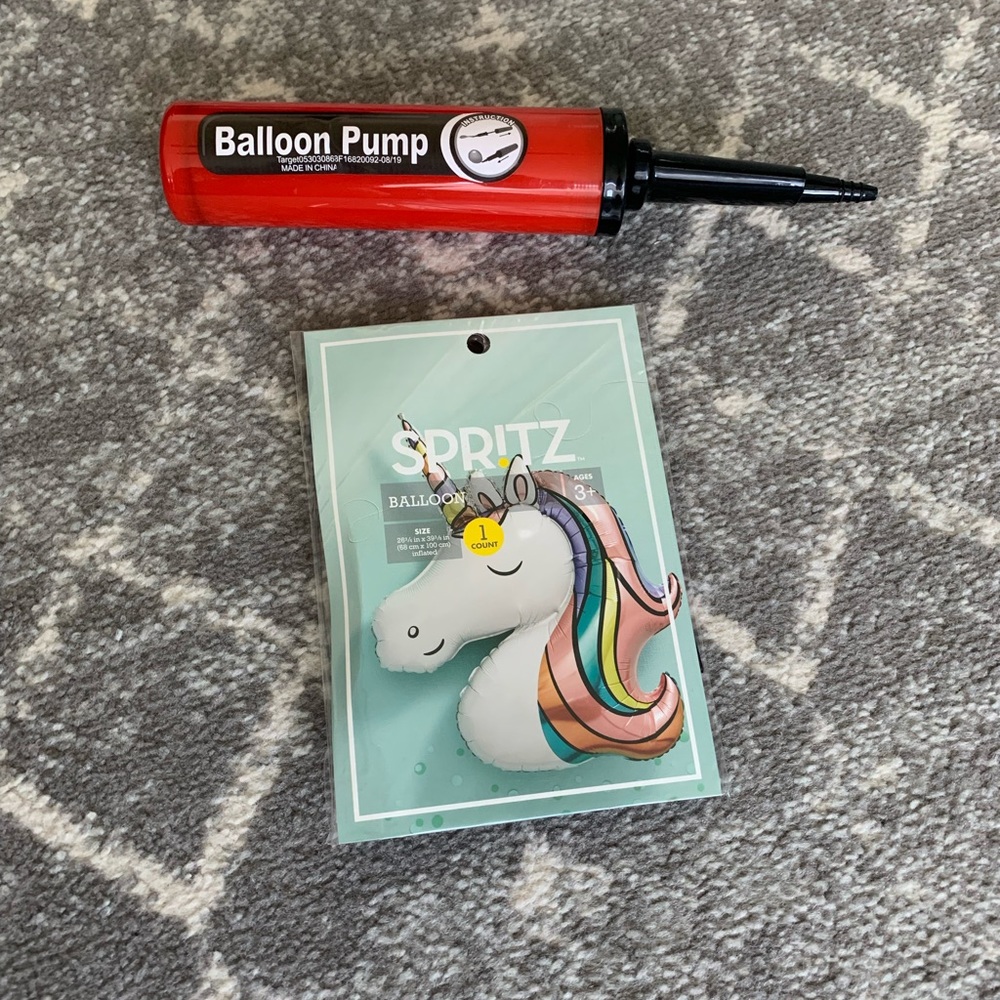 Unicorn foil balloon in original packaging & balloon pump